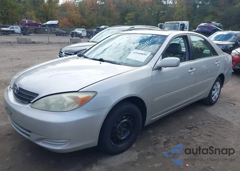 2004 Toyota Camry Le z USA, uszkodzony, nr VIN 4T1BE32K04U300643
